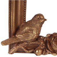 goudkleurige fotolijst vogel staand